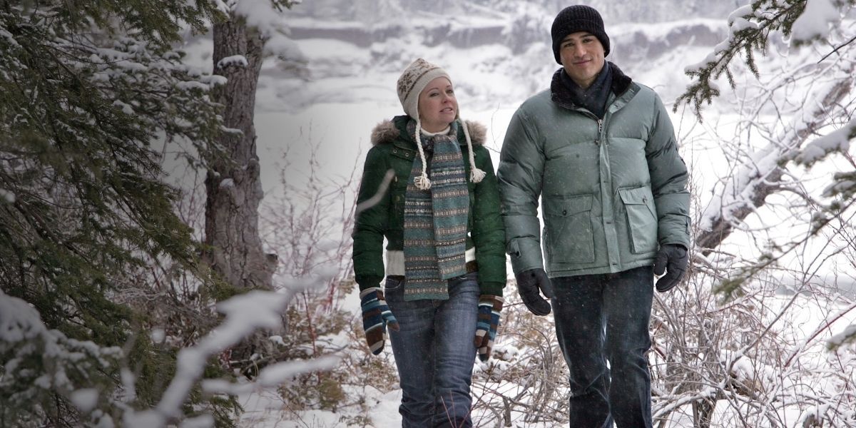 Trudy and Nick/David walking through the snow together in Holiday In Handcuffs