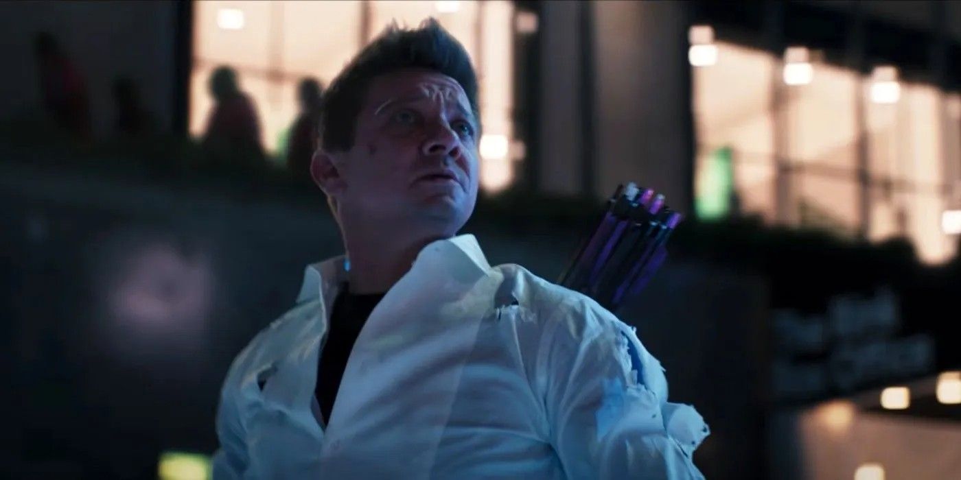 Jeremy Renner as Clint Barton in a white button down with a quiver of arrows in Hawkeye