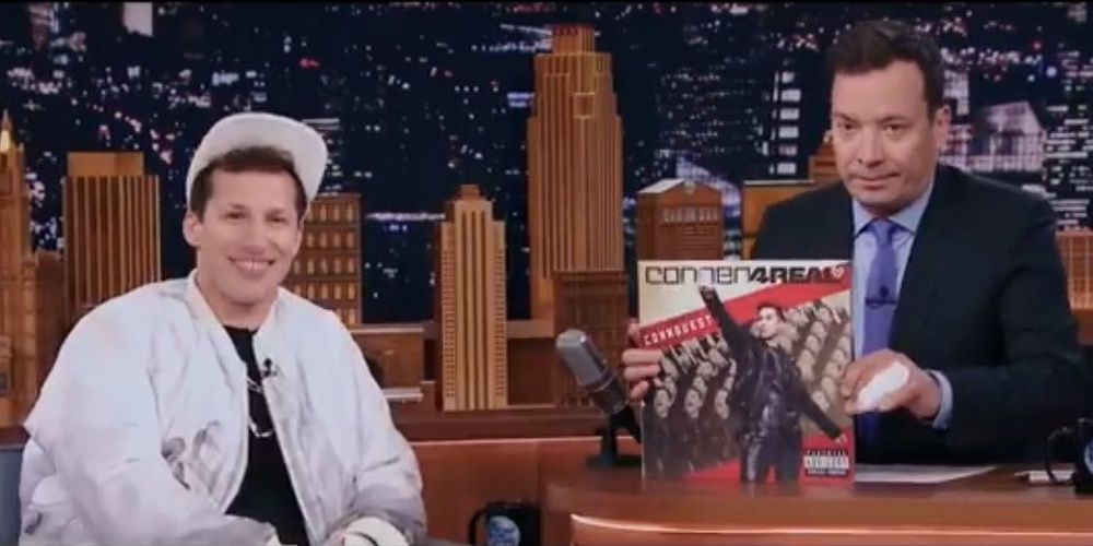Jimmy Fallon holding Connor's album while talking to him in a still from Popstar