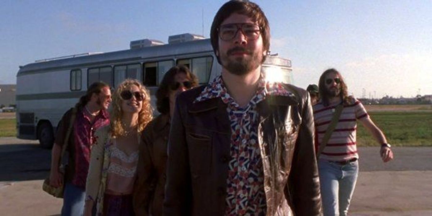 Jimmy Fallon standing in front of Stillwater members in Almost Famous