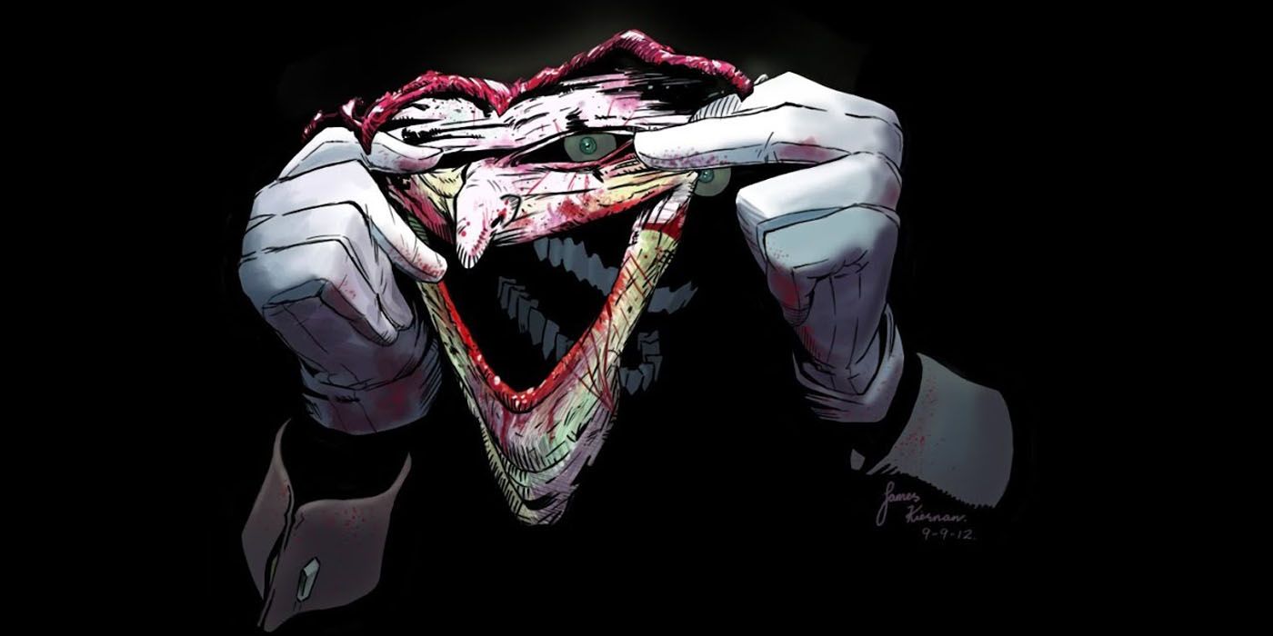 Joker holding up his skinned face.