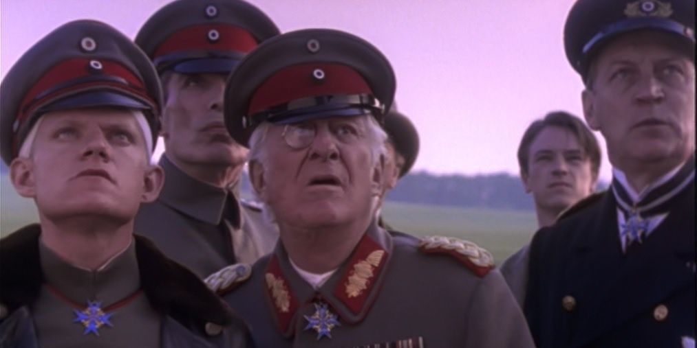 Jon Pertwee stares in shock as a German general, in Young Indiana Jones.
