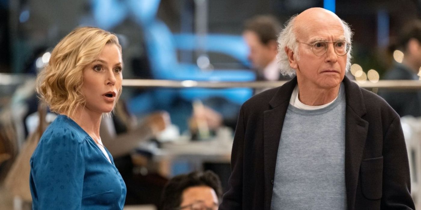 Julie Bowen and Larry look shocked in Curb Your Enthusiasm