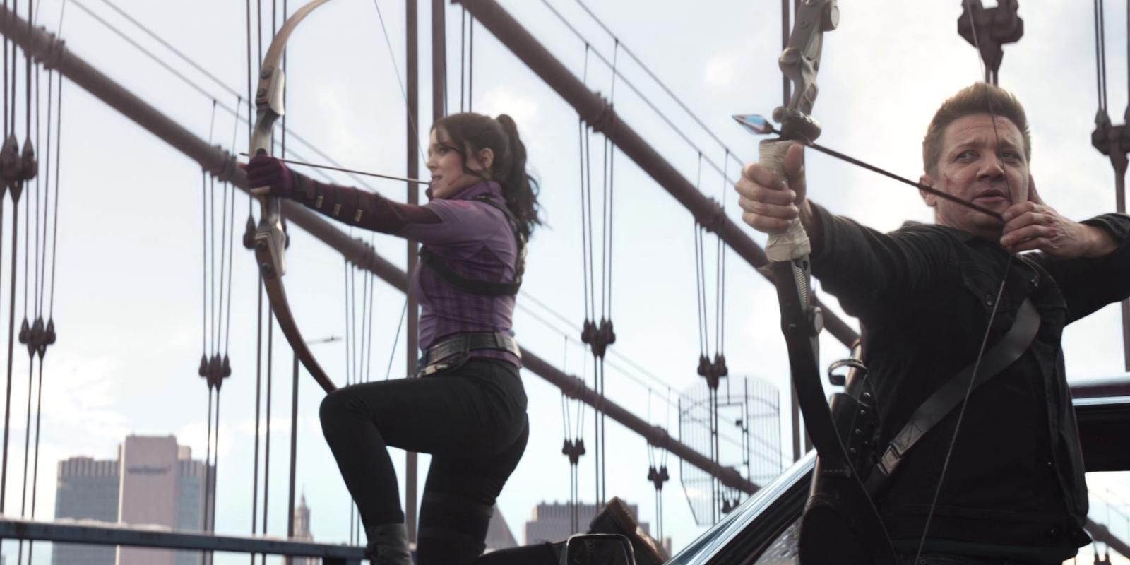 Kate Bishop strikes a hero pose in her archer outfit with Clint beside her in Hawkeye