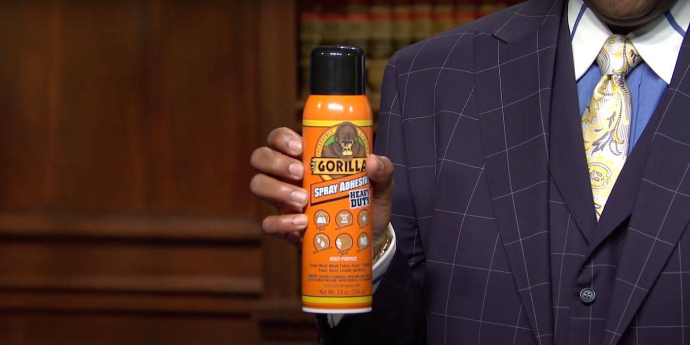 Kenan Thompson holding a can of Gorilla Glue on SNL
