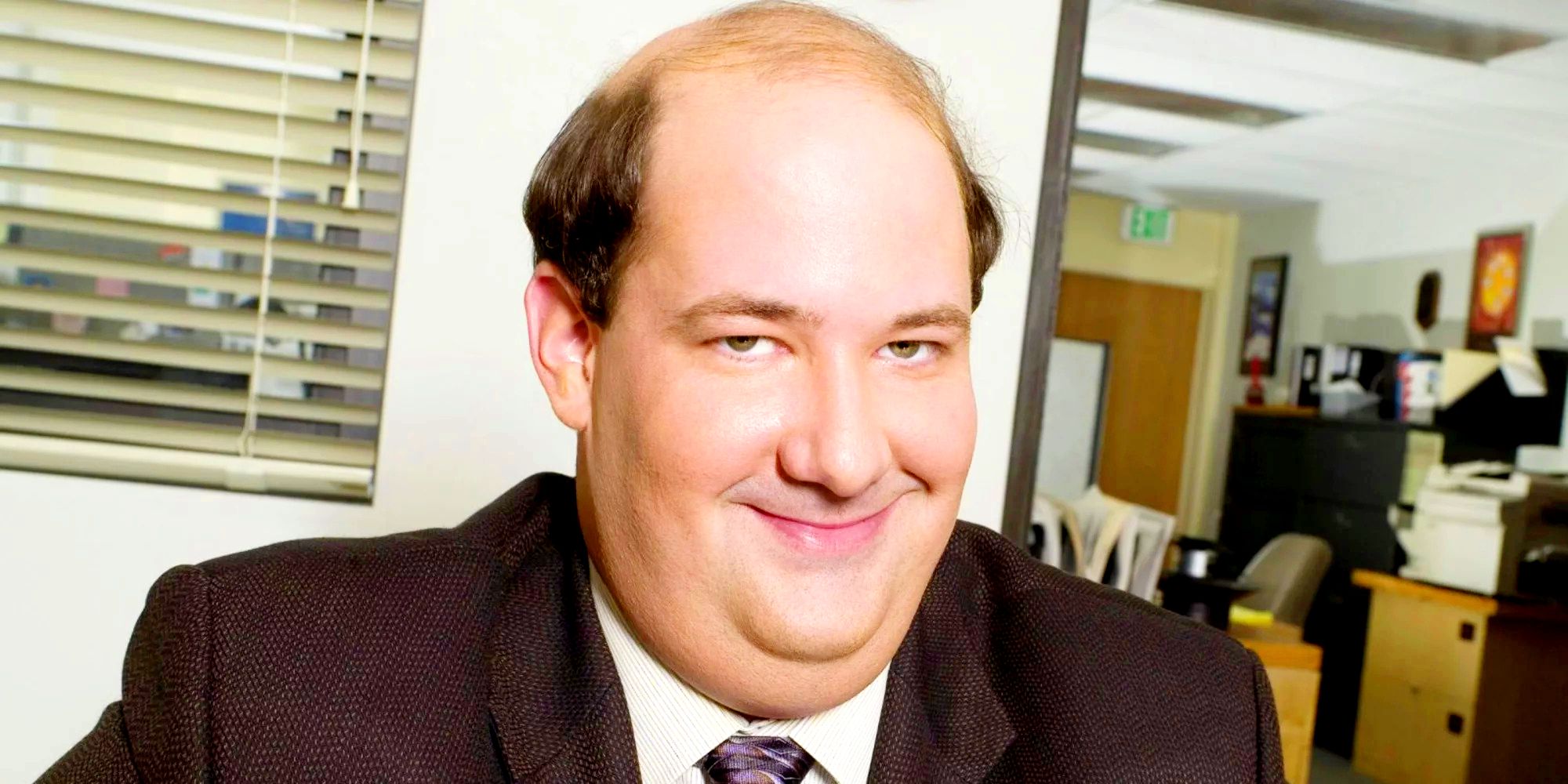 Kevin Malone laughing for the camera in The Office
