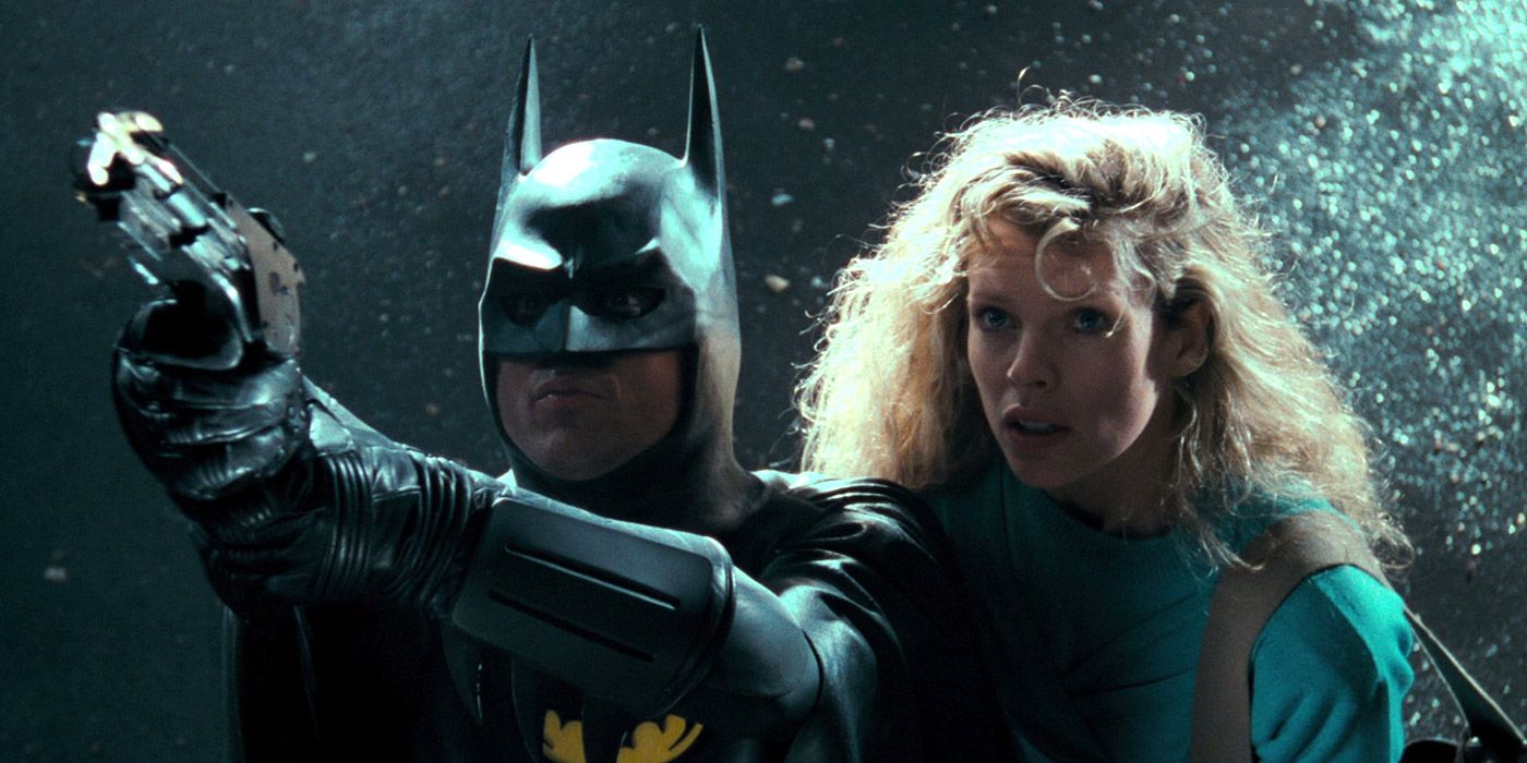 Batman and Vicki Vale in 1989&rsquo;s Batman preparing to use the grappling gun