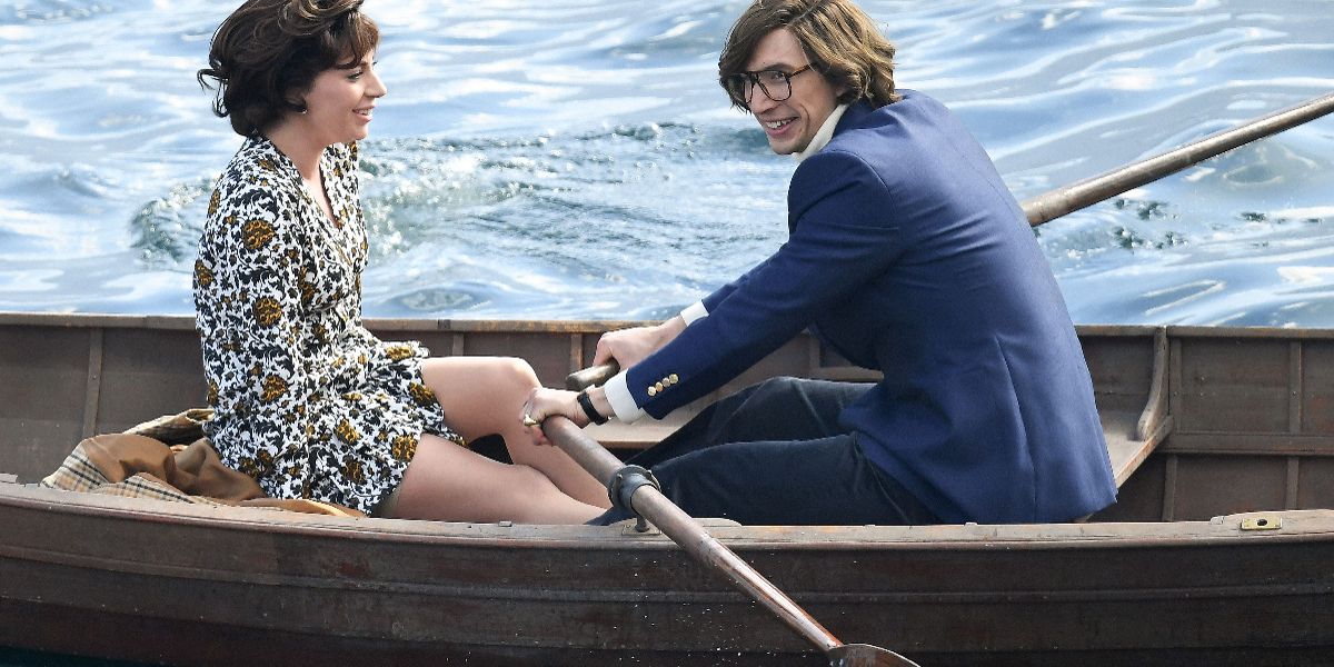 Patrizia Reggiani (Lady Gaga) in a rowboat with Maurizio Gucci (Adam Driver) in House of Gucci