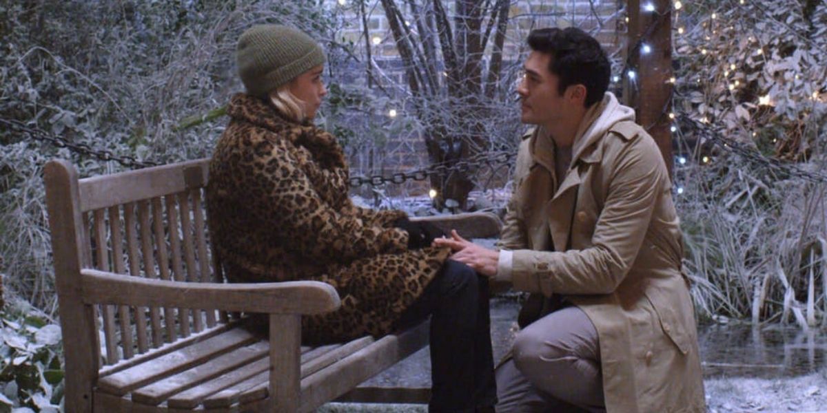 Tom talking to Kate on the bench in Last Christmas