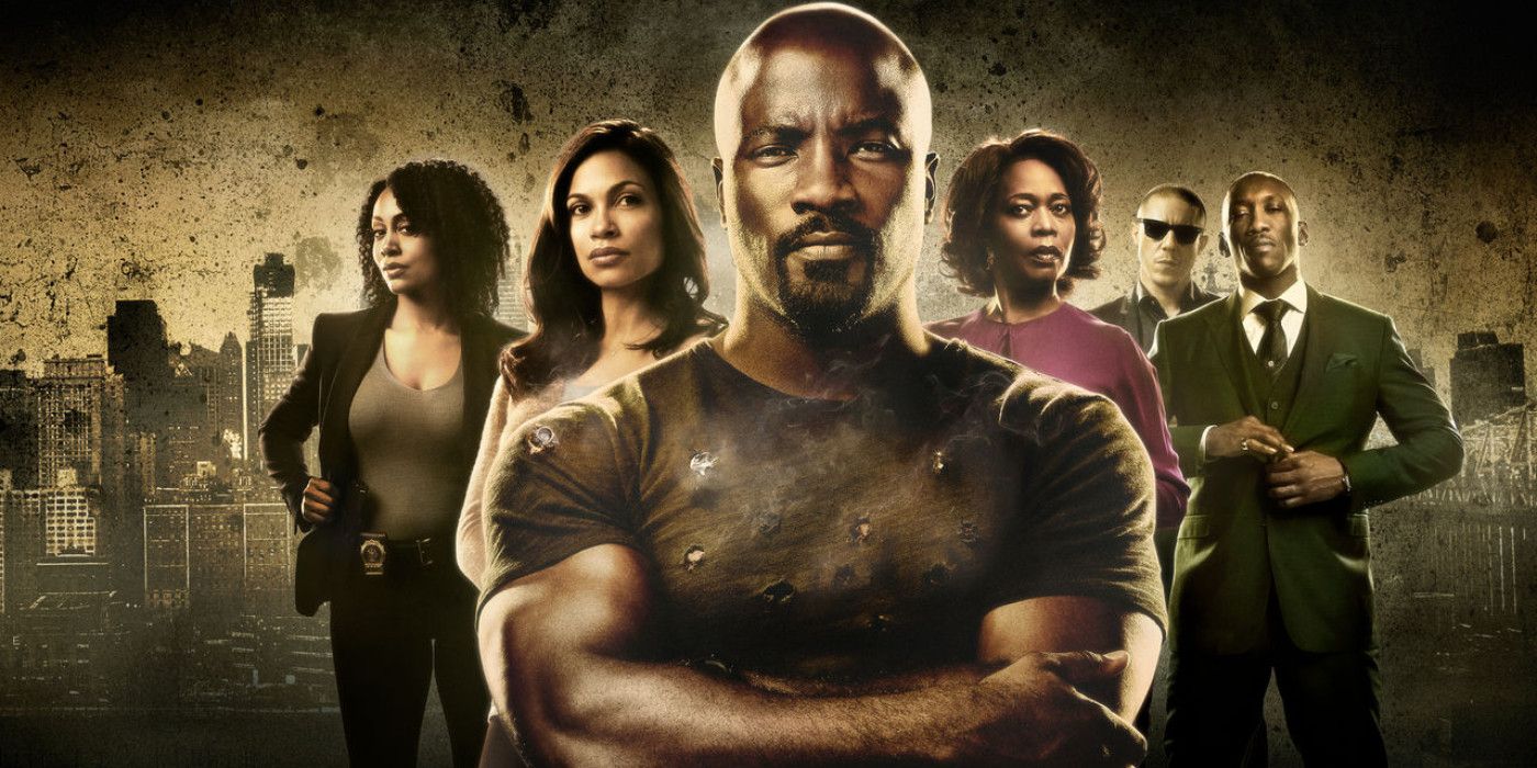 The cast of Luke Cage pose and look at the camera in Luke Cage.
