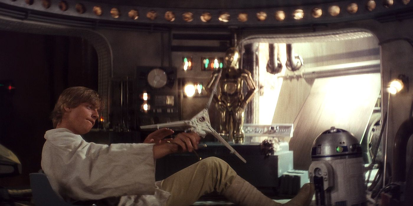 Luke Skywalker on Tatooine with the droids in Star Wars