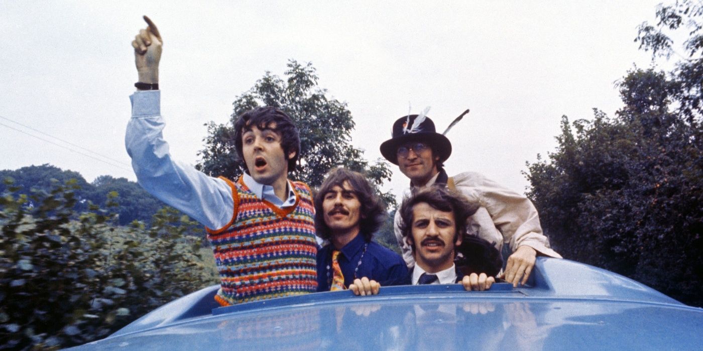The Beatles hanging out a car in Magical Mystery Tour