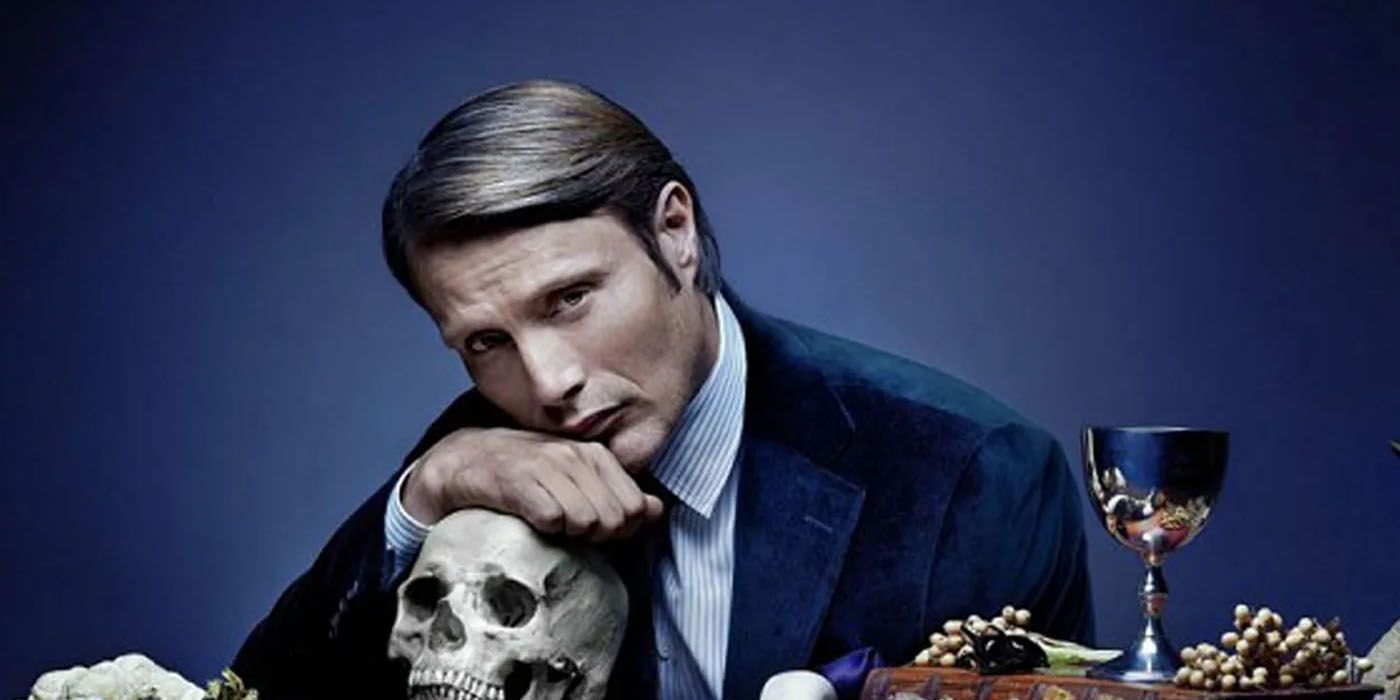 Hannibal Lecter leaning on a skull in Hannibal