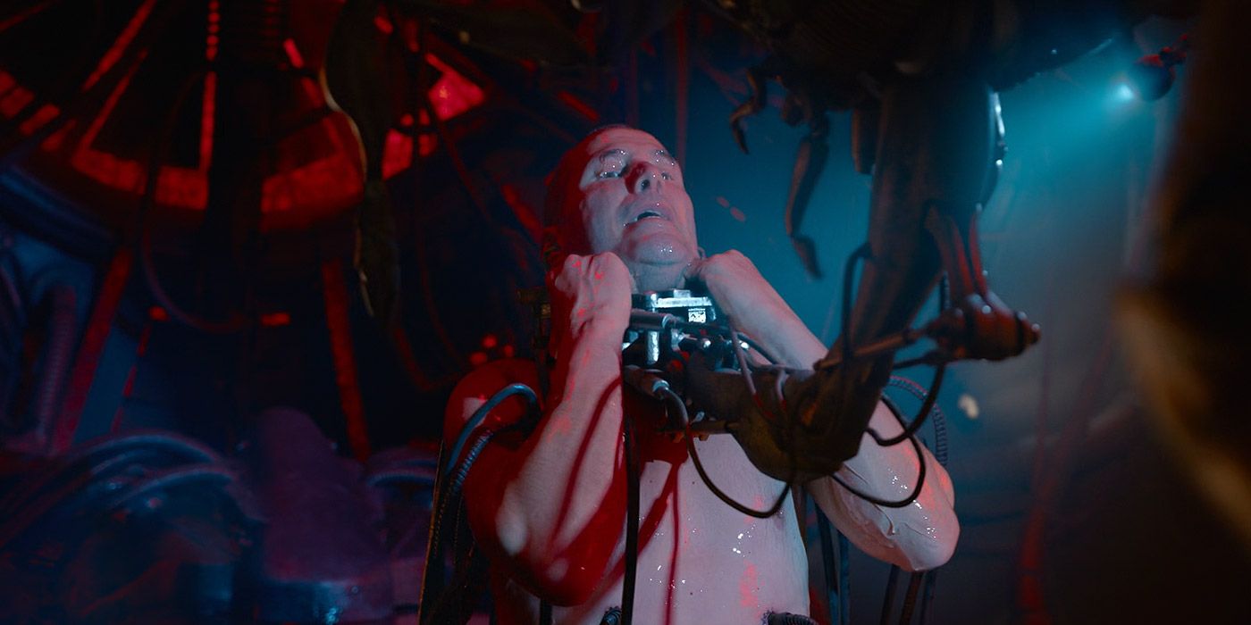 Neo in the real world getting strangled in The Matrix Resurrections