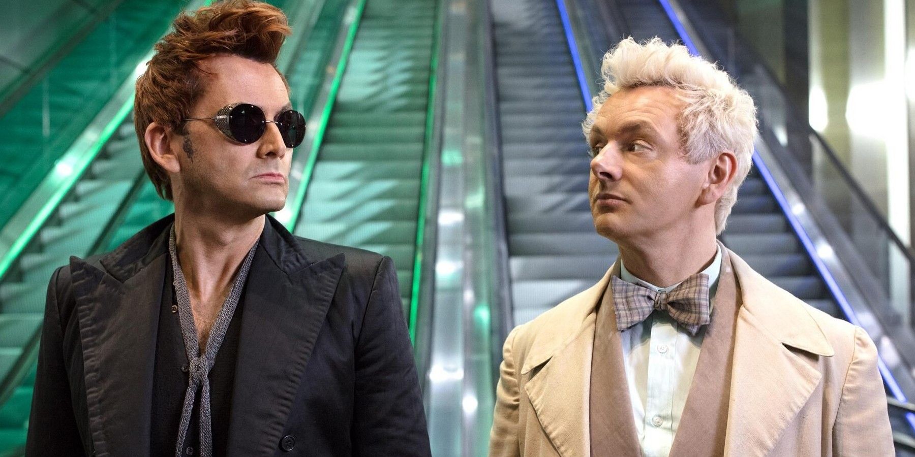 David Tennant and Michael Sheen give knowing looks in Good Omens.