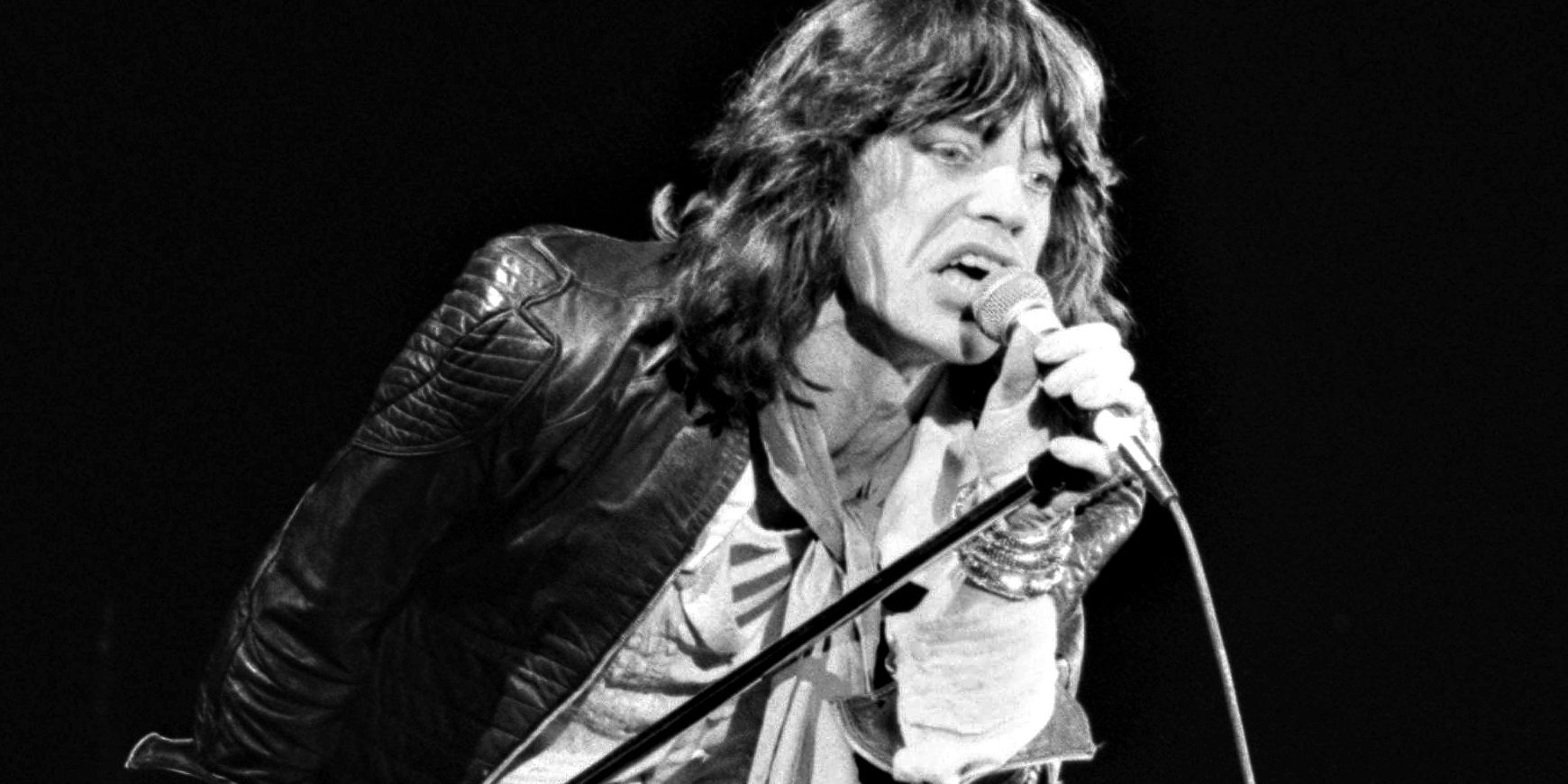 Mick Jagger performing live on stage