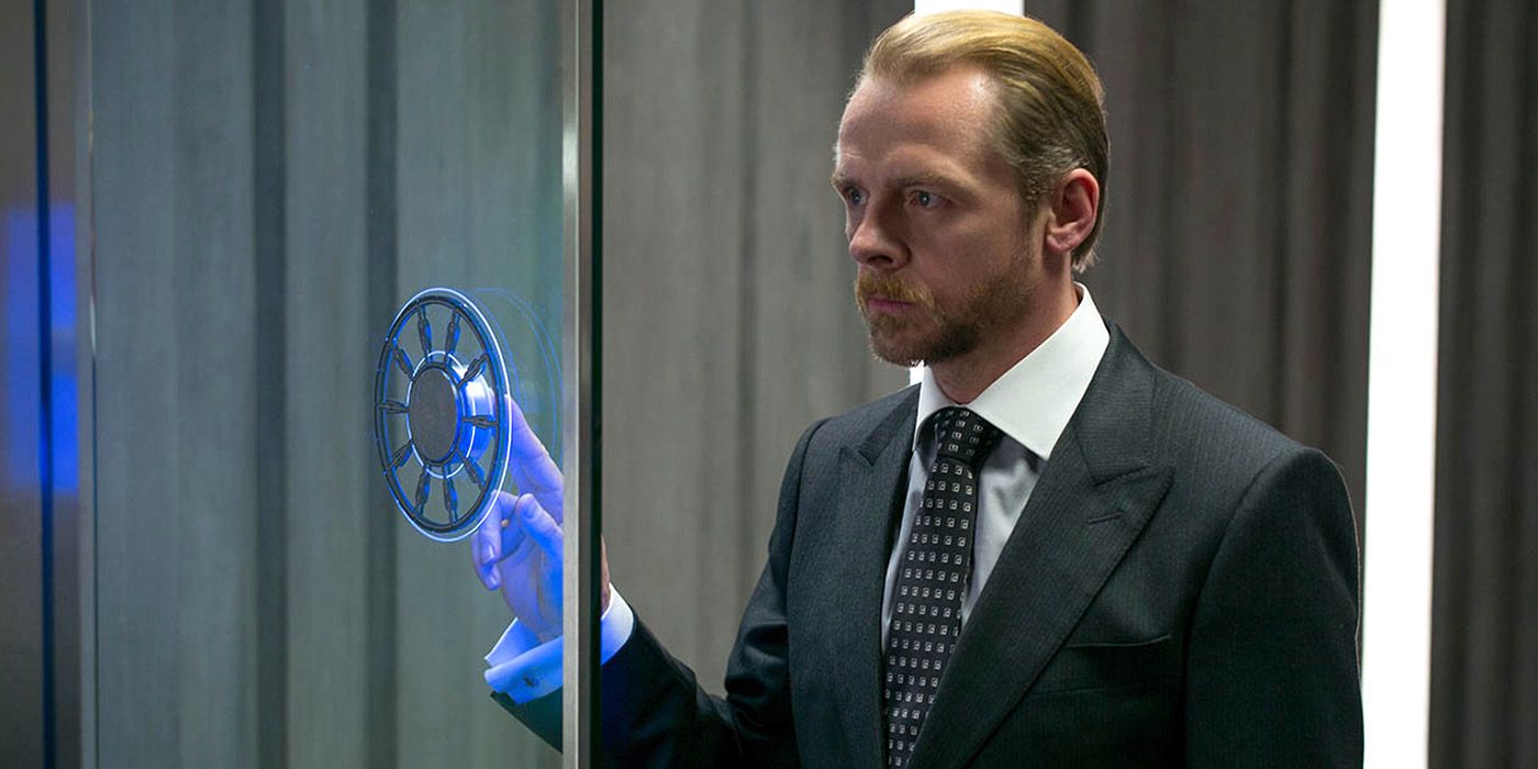 Benji Dunn touching a device in Mission: Impossible