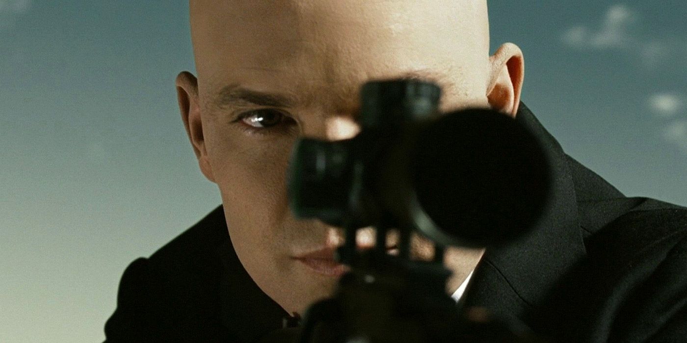 Agent 47 sniping a target in Hitman