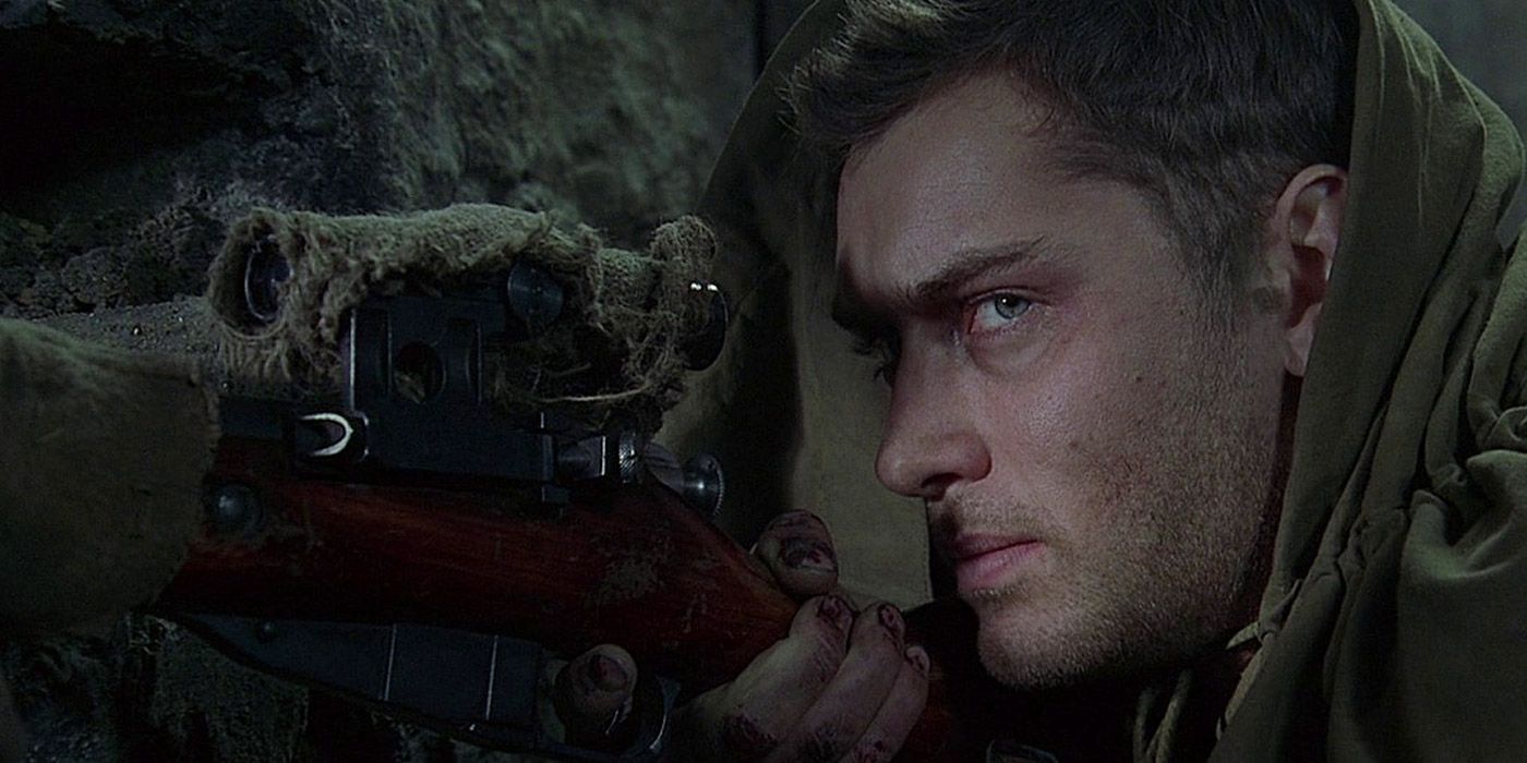 Jude Law as Vassili Zaitsev hunkered down with a sniper rifle in Enemy at the Gates