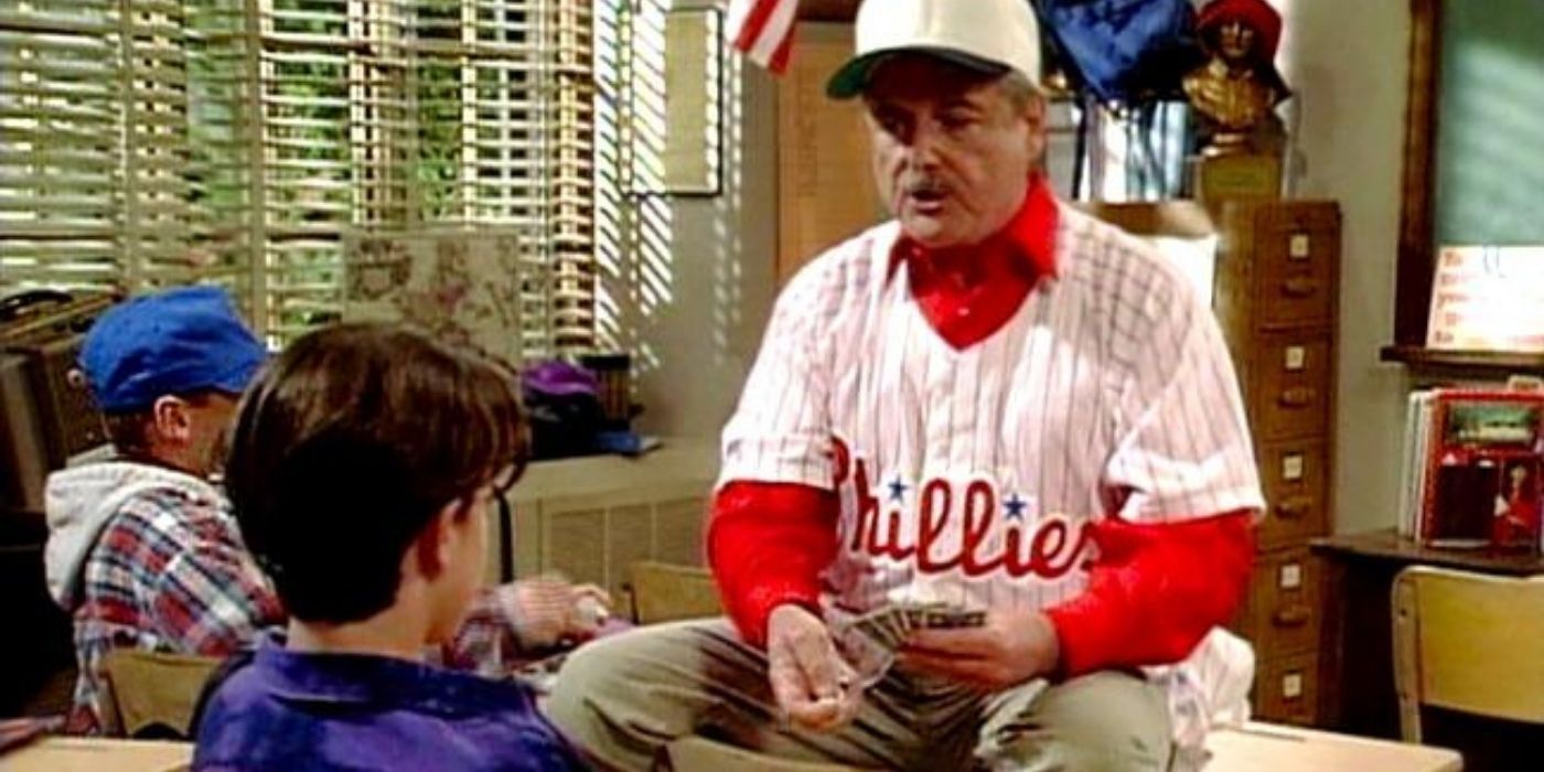 Mr. Feeny dressed as Cory, playing cards with Shawn on Boy Meets World