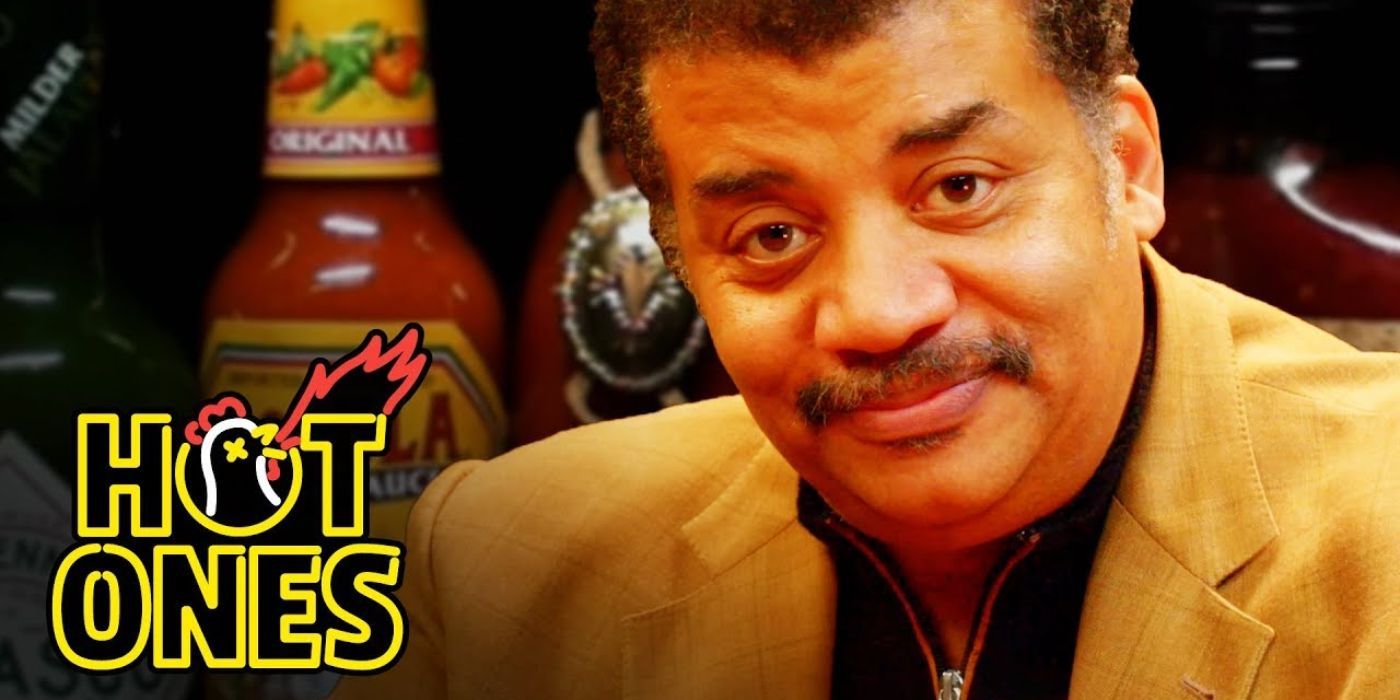 Neil de Grasse Tyson looks at the camera on Hot Ones