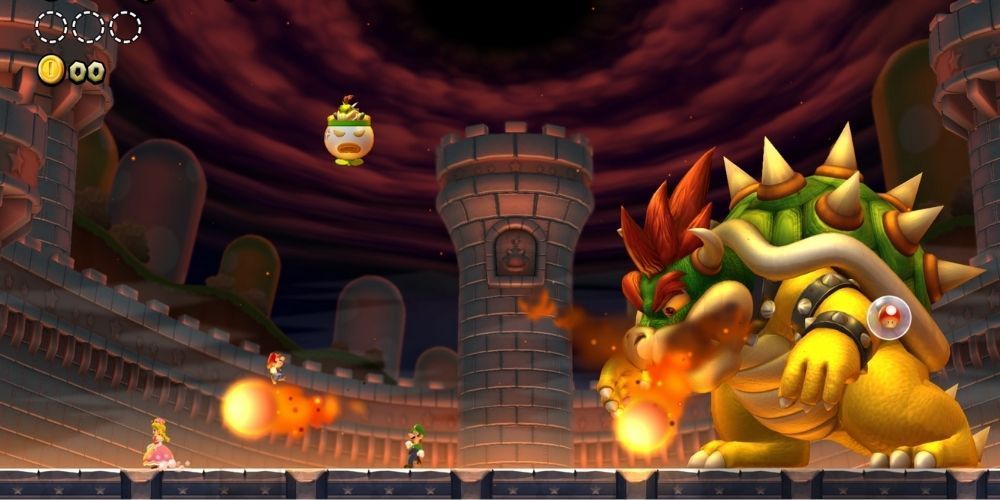Mario, Peach, and Luigi battle a fire-breathing Bowser in New Super Mario Bros