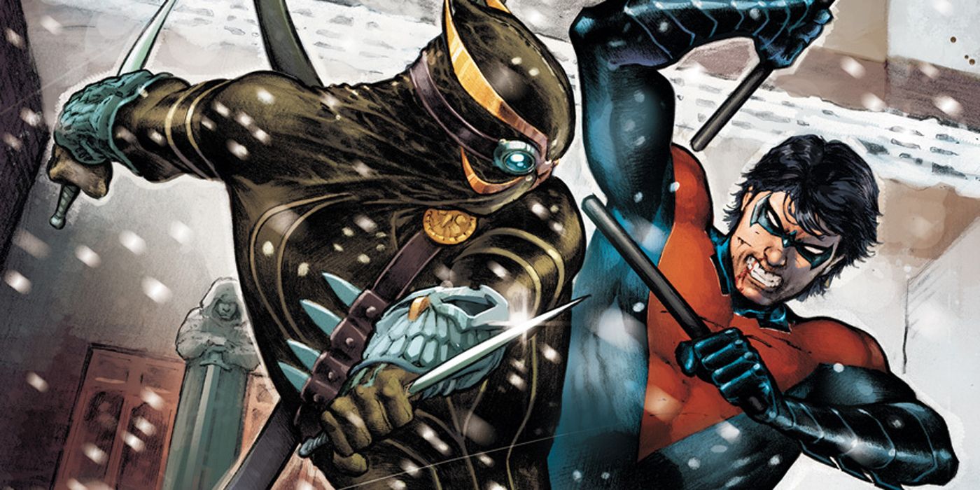 Nightwing fighting Talon in the snow.