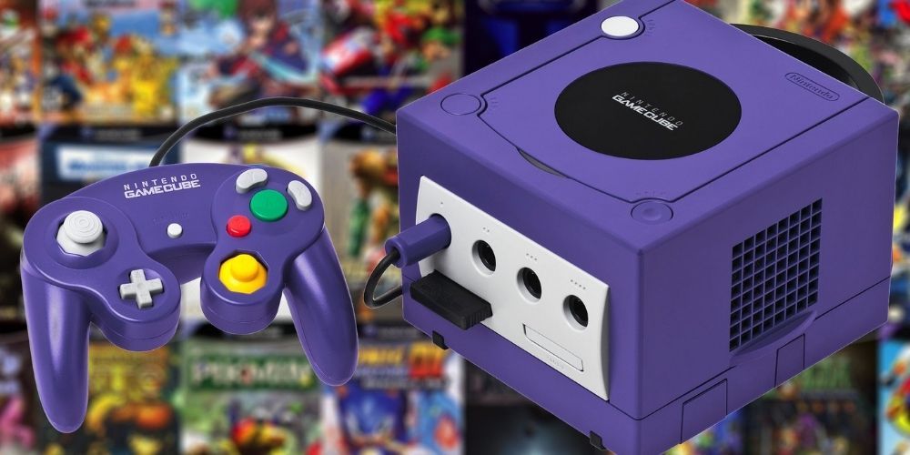 A purple GameCube and controller sit in front of GameCube game cases