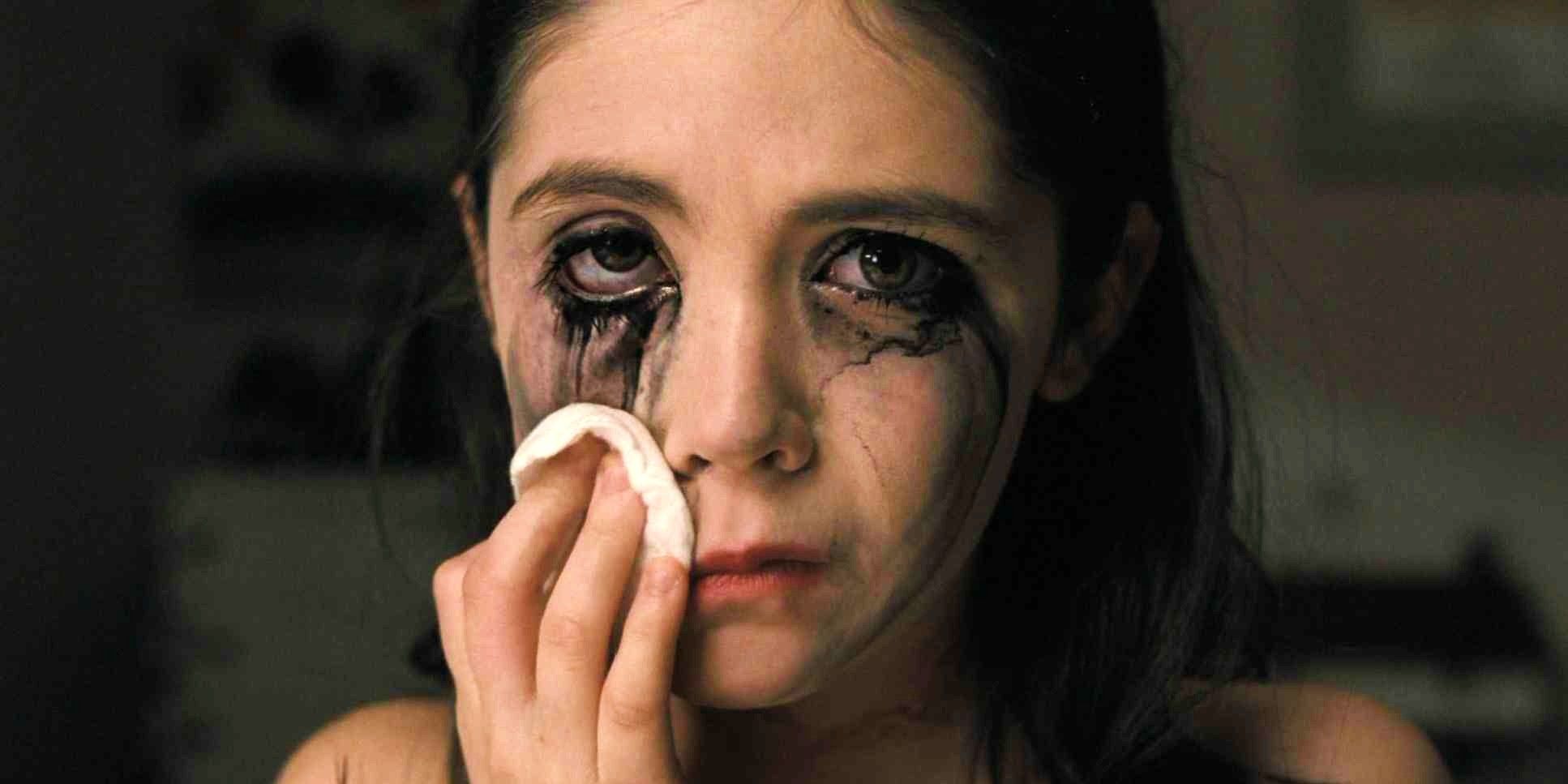 Esther wiping her makeup in Orphan