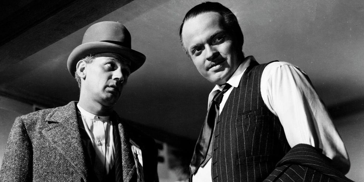 Kane and a man look down in Citizen Kane.