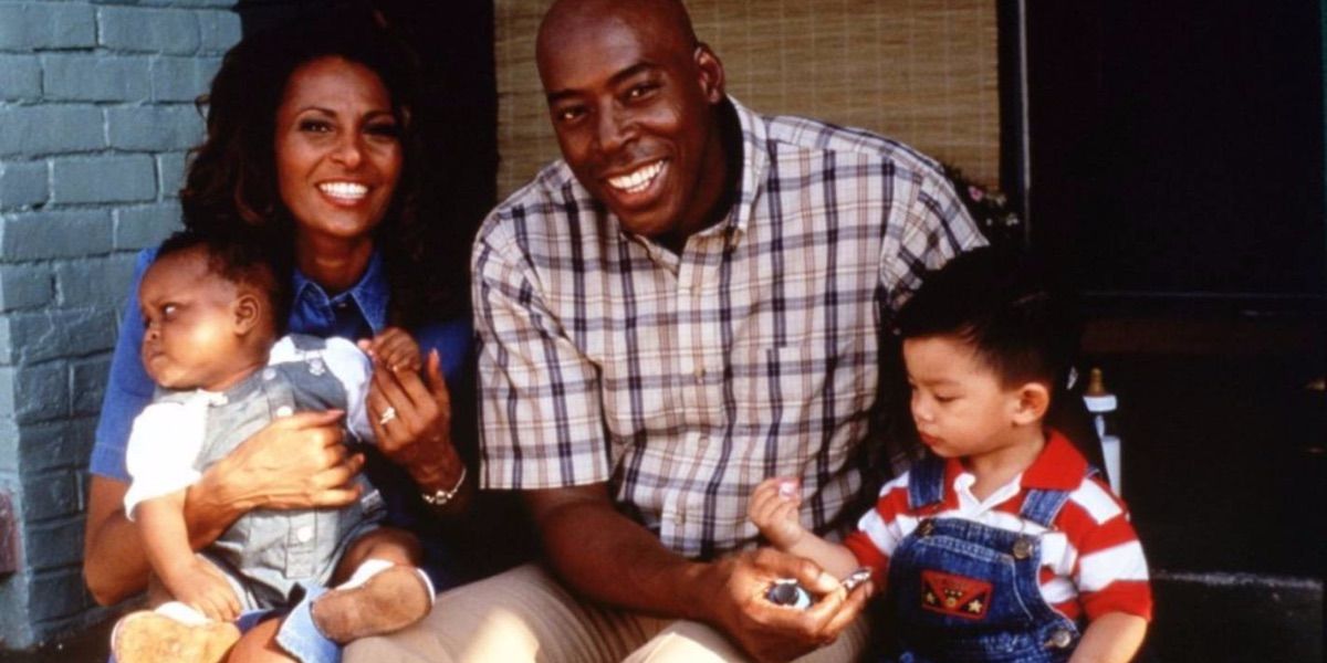 Pam Grier and Ernie Hudson pose with two children in Fakin' Da Funk
