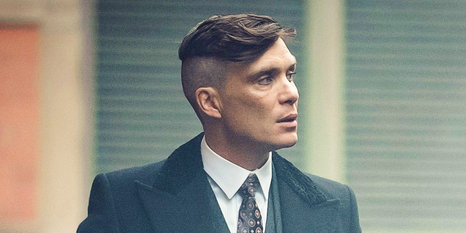 Tommy Shelby (Cillian Murphy) on the street turning to his left in Peaky Blinders