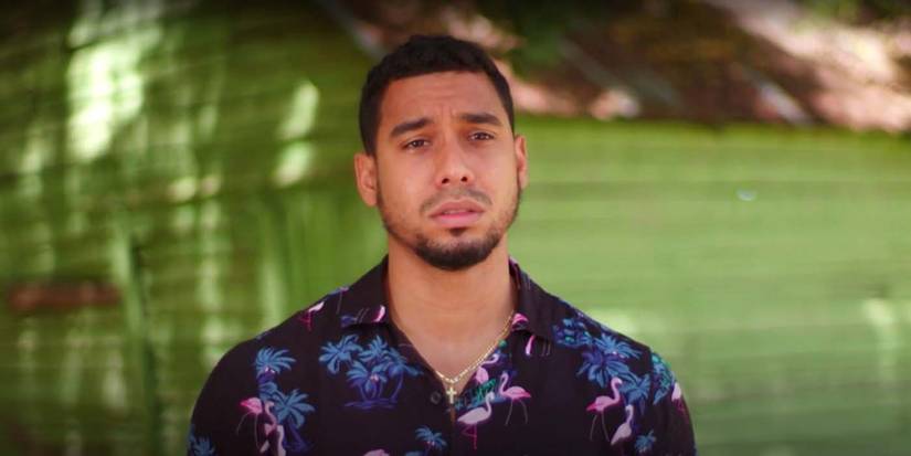 Pedro Jimeno from The Family Chantel wearing blue shirt outside