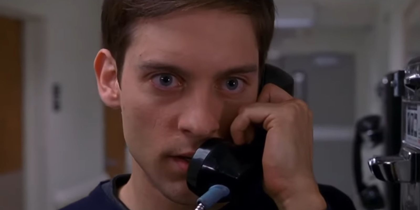 Peter Parker speaking with Green Goblin on the phone in Spider-Man 2002