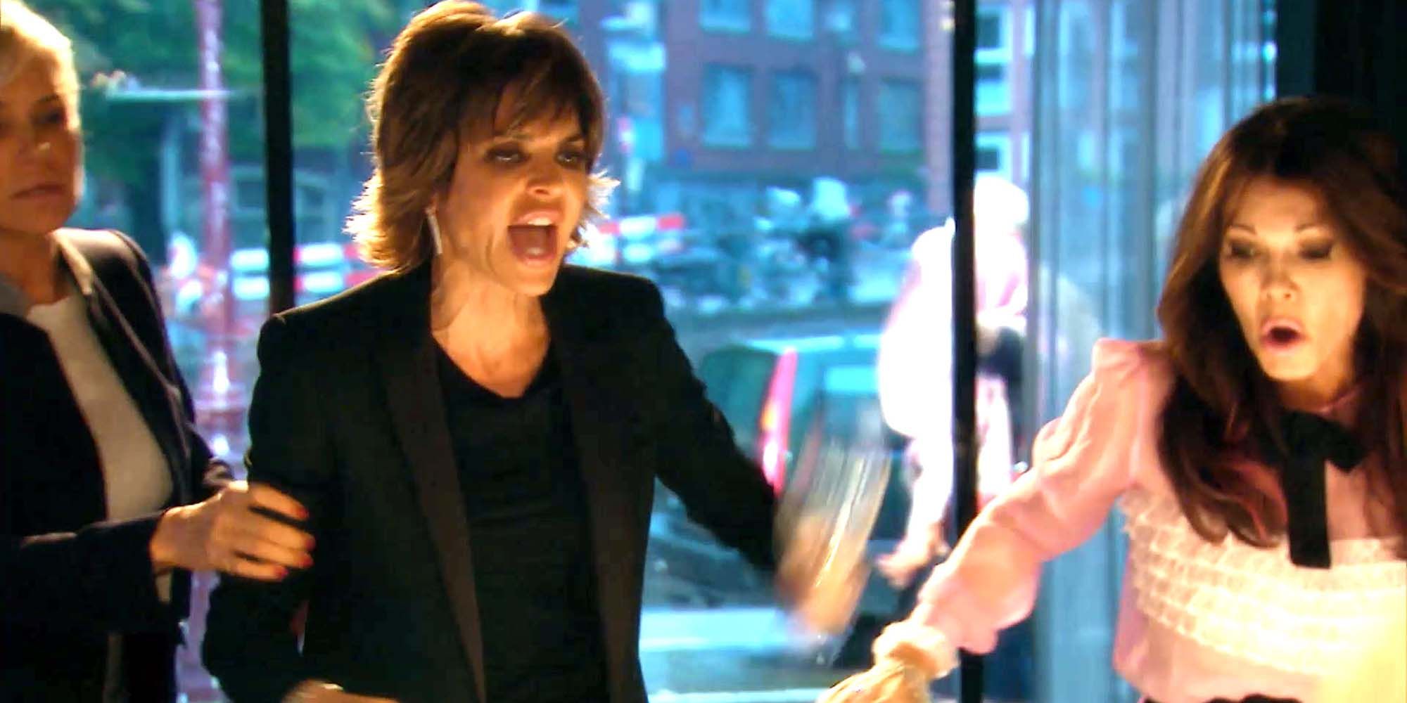 Lisa Rinna slamming a wine glass on the table as LVP jumps up on RHOBH