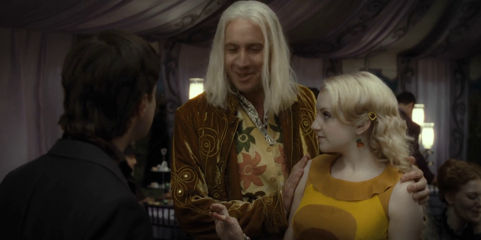 Xenophilius Lovegood and Luna at the wedding in Harry Potter and the Deathly Hallows