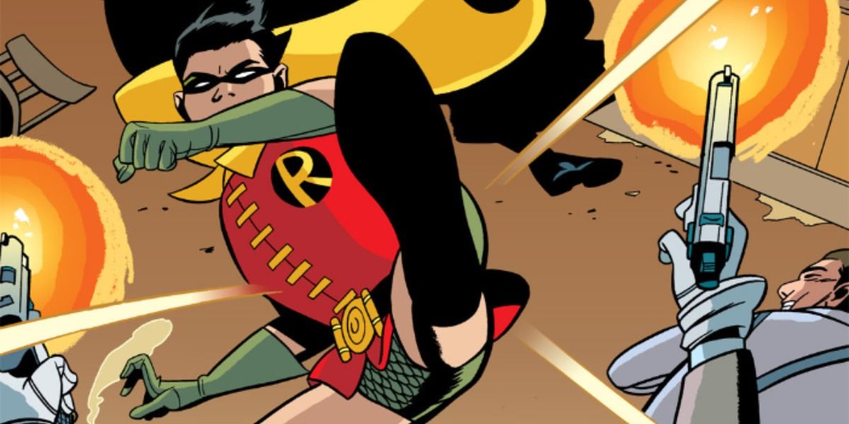 Robin kicks Two-Face in Robin: Year One.