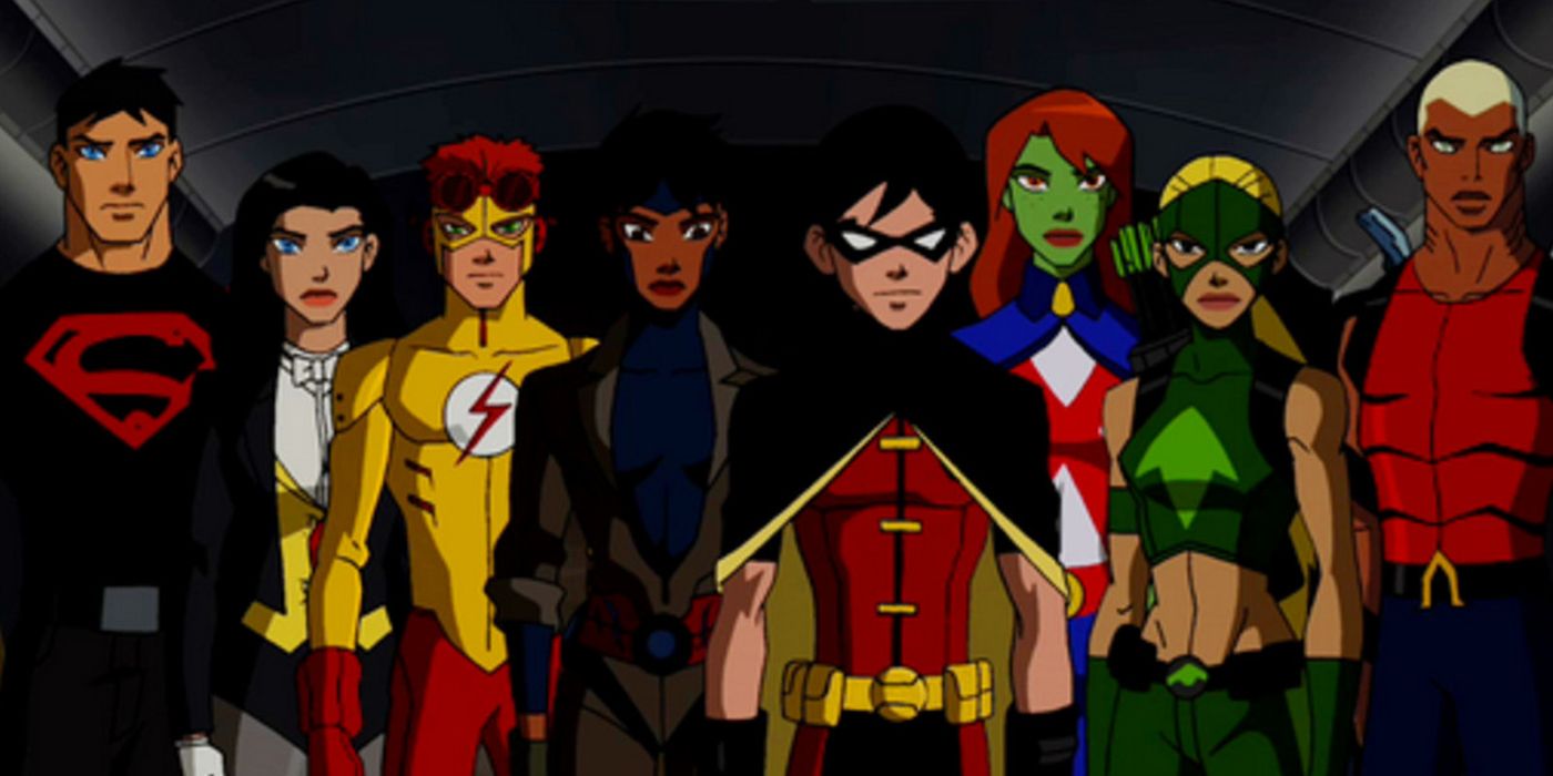 Robin standing in front of Young Justice.