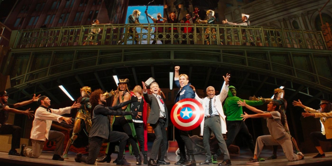 The cast of Rogers: The Musical pose on stage in Hawkeye.