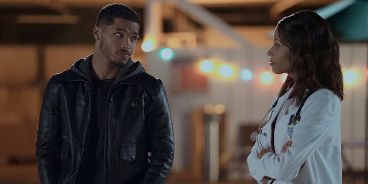Rome Flynn and Isis King stand on With Love