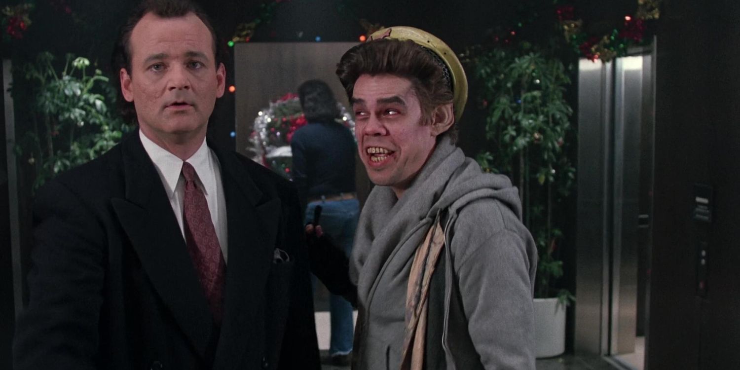 Bill Murray with Ghost of Christmas Past in Scrooged.