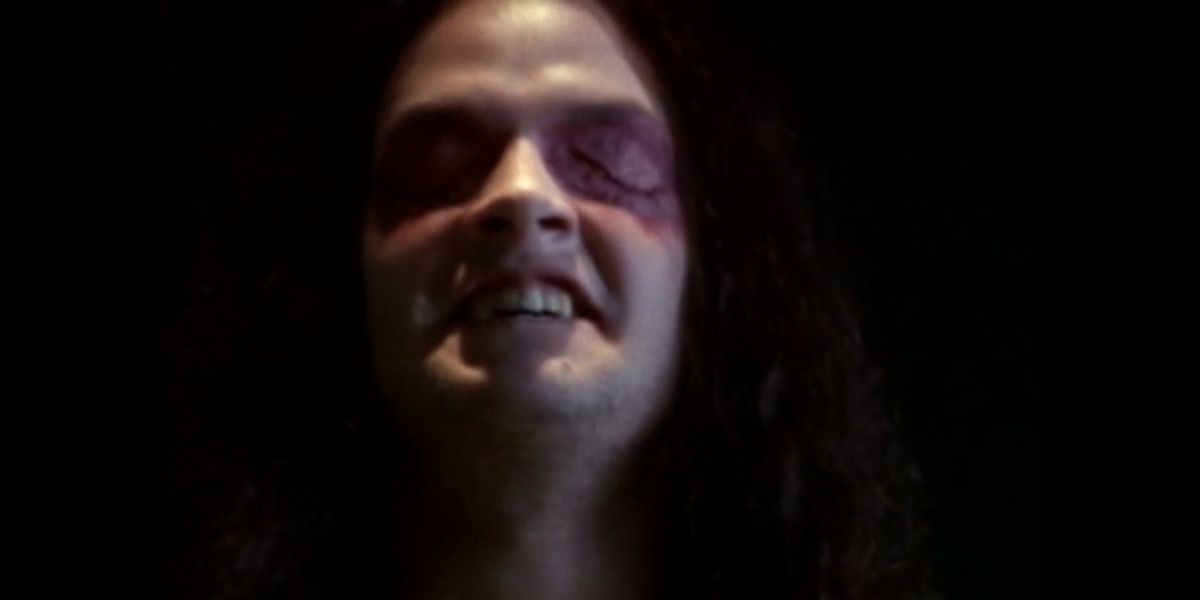 An eyeless victim of the Kromags steps out of the darkness.