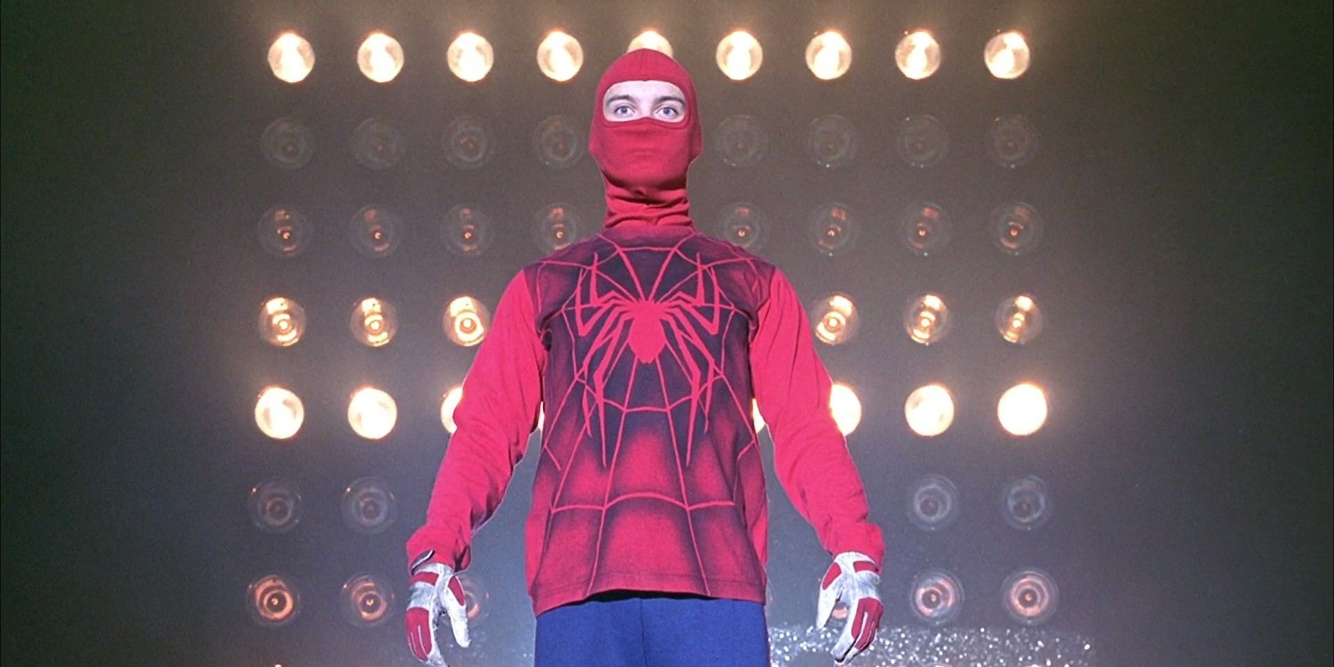 Peter Parker wearing his first Spider-Man suit in the wrestling