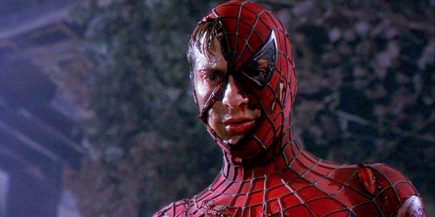 An image of Spider-Man standing with a ripped mask in the first movie