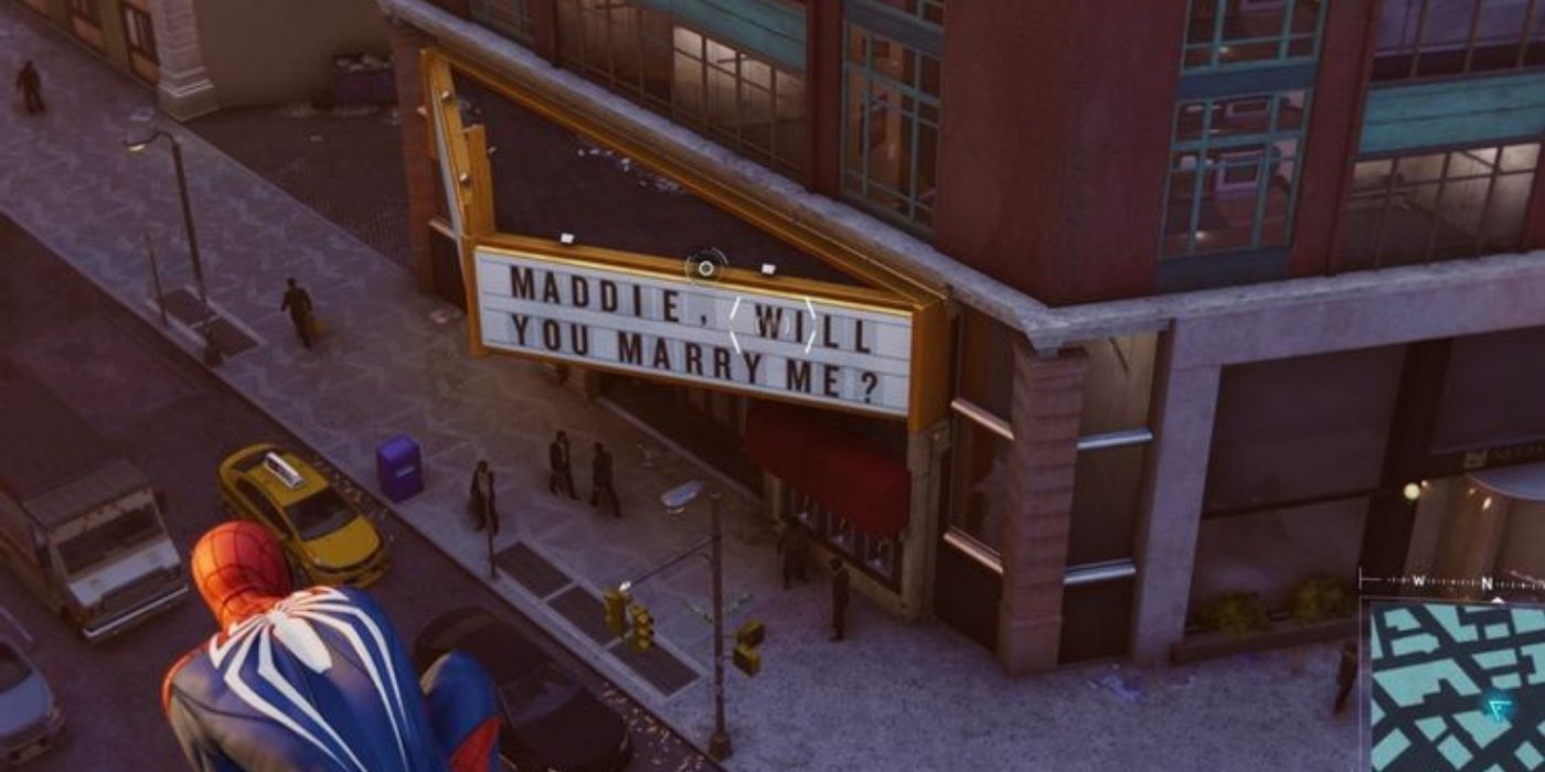 Spider-Man looking at a marquee board in Marvel's Spider-Man