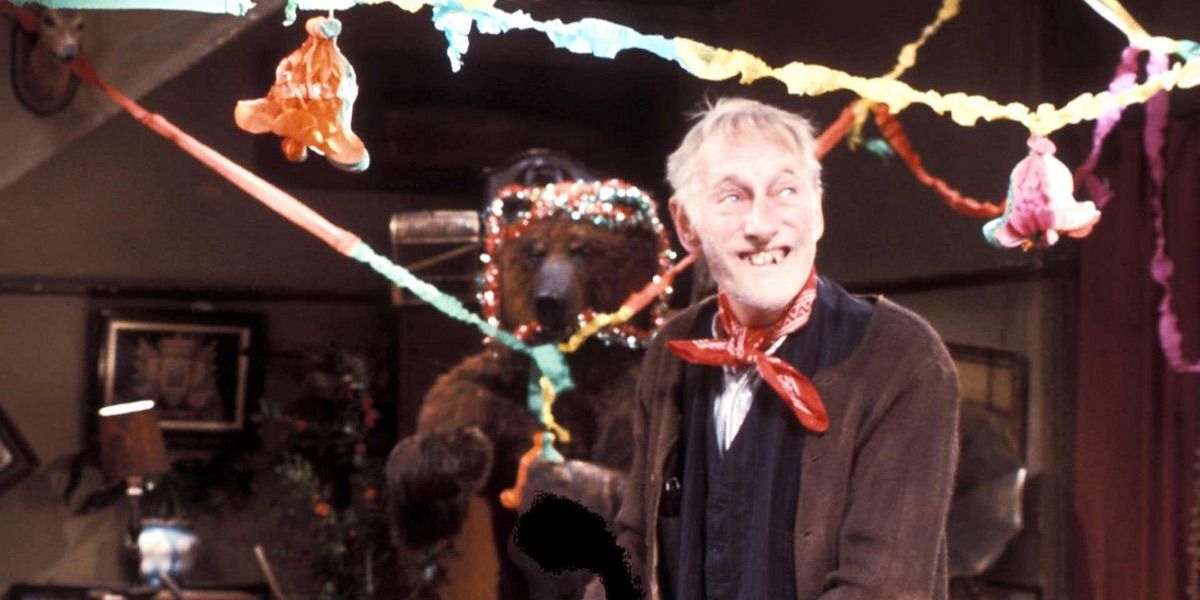 Albert wrapped in Christmas confetti from Steptoe and Son