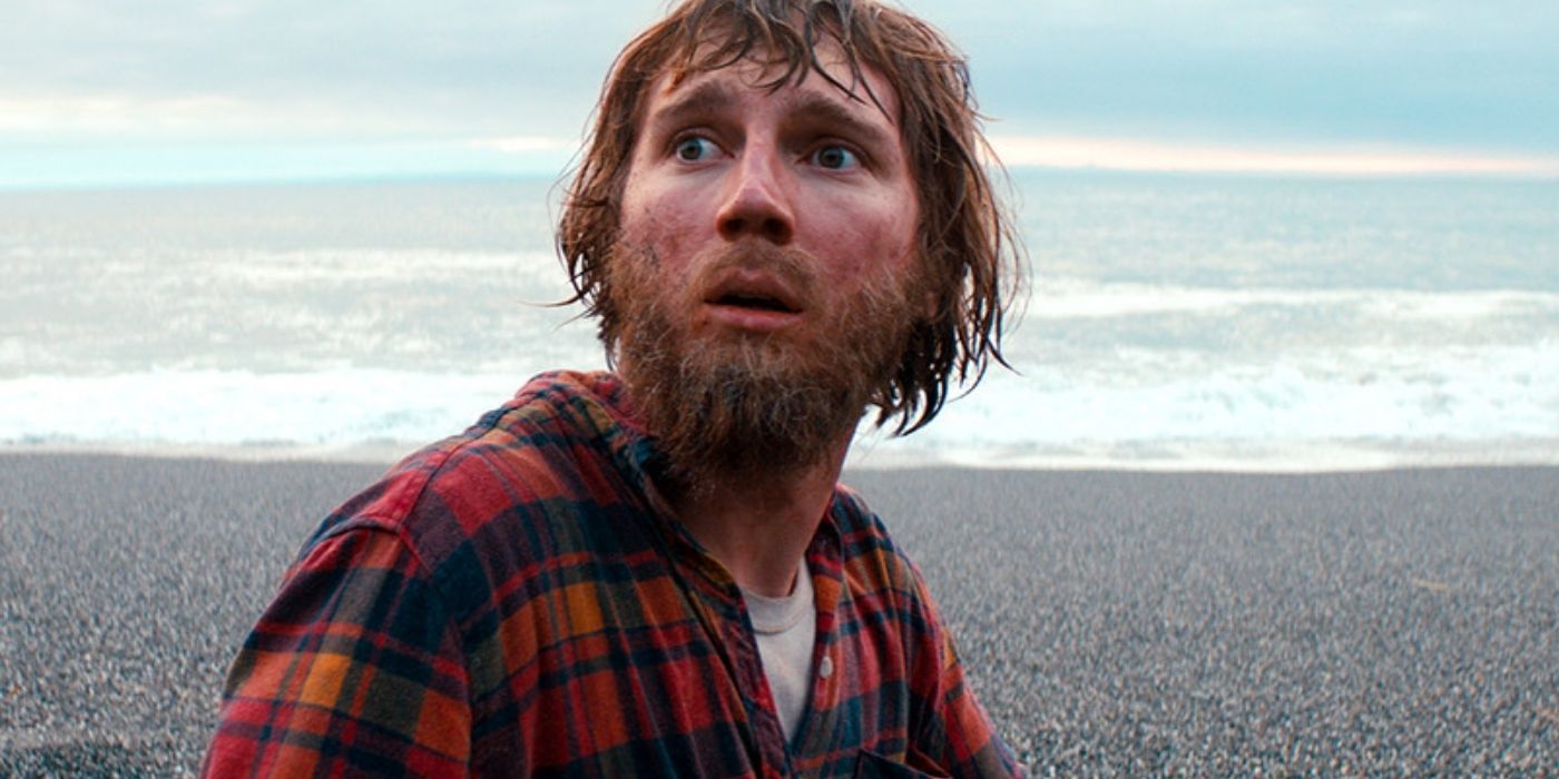 Hank looking confused while at a beach in Swiss Army Man