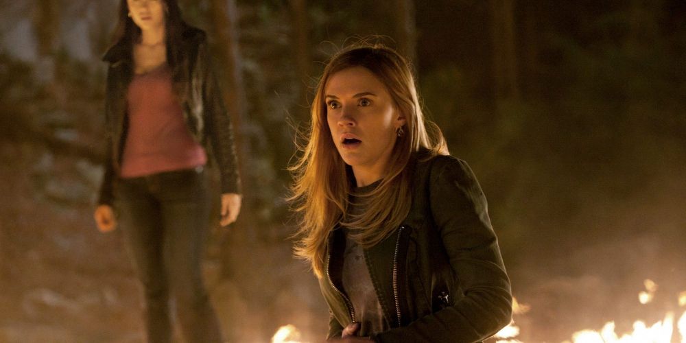 Jenna looks shocked before a fiery ground on The Vampire Diaries