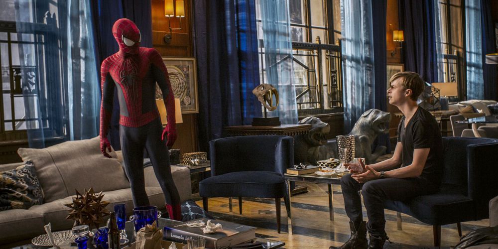 Spider-Man looking at Harry in Harry's apartment in The Amazing Spider-Man 2