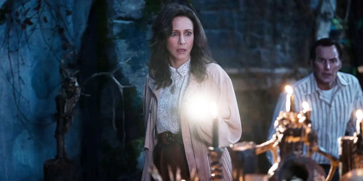 A woman shines a flashlight in The Conjuring: The Devil Made Me Do It
